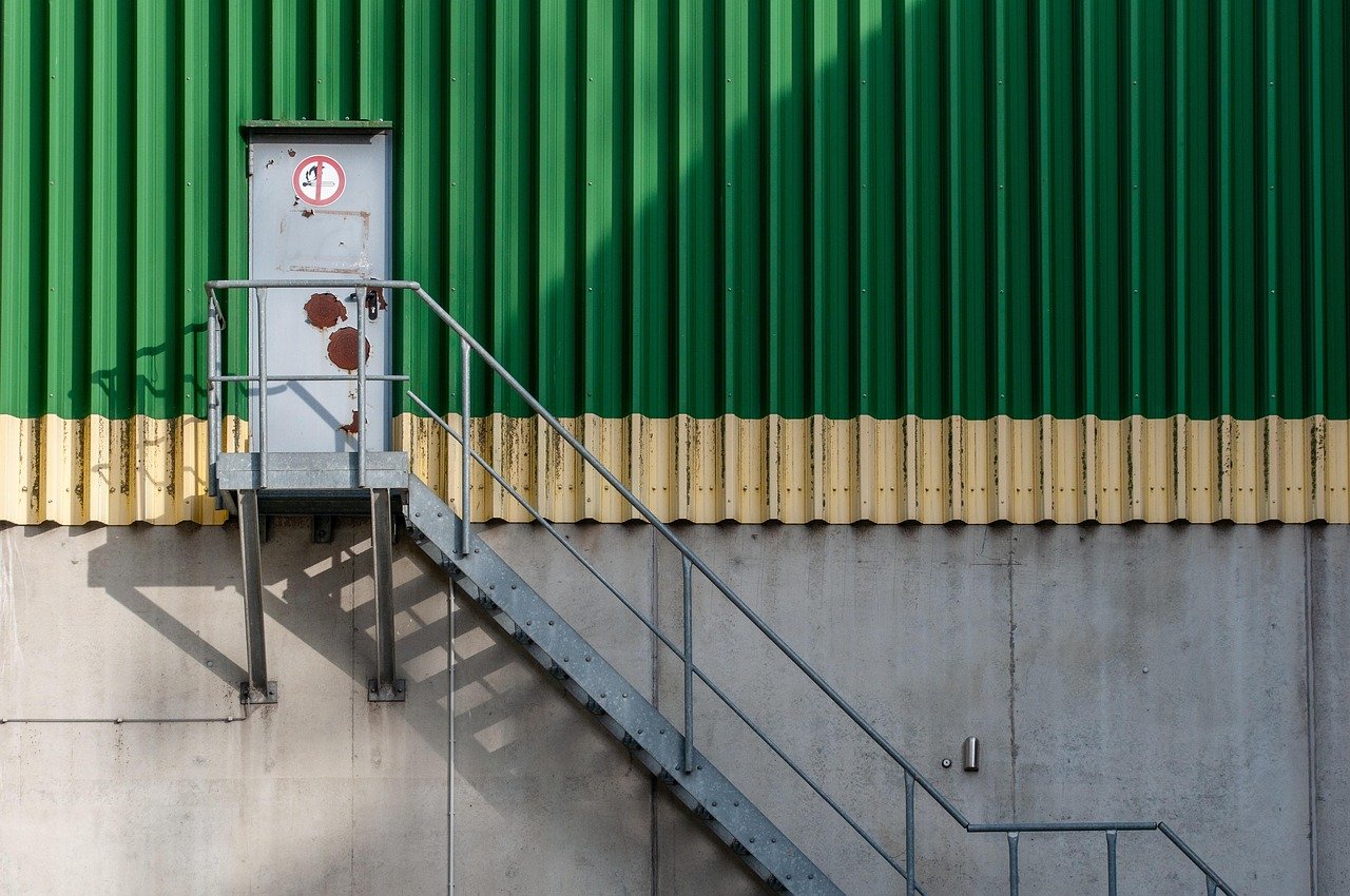 Industrial warehouse exterior with loading area